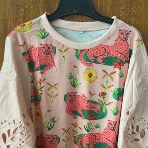 Cheetah floral pink top.  Size small or fit medium